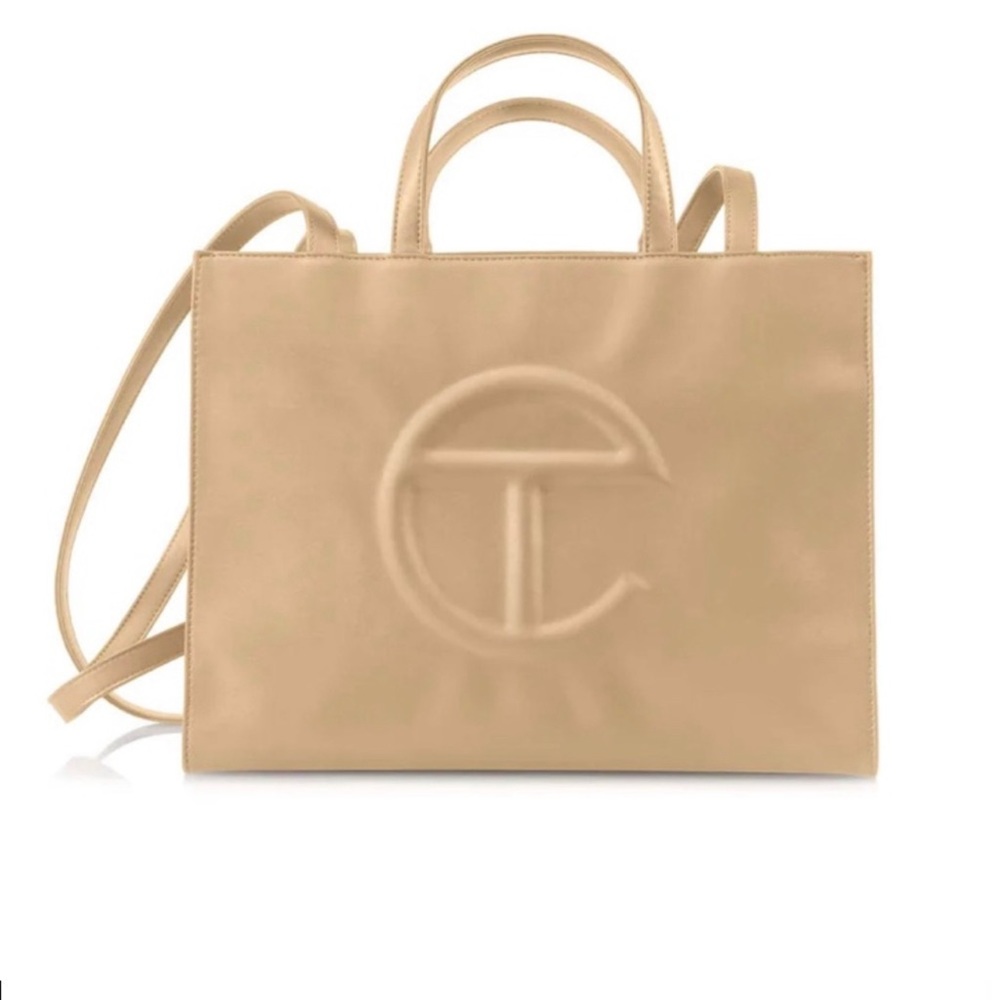 TELFAR Medium Cream Shopping Bag
Vegan Leather Unisex Tote…super hard to find!